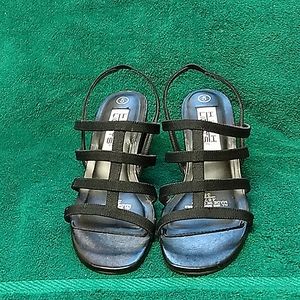 Strappy, gladiator sandals. Black with 2 inch heels.